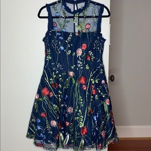 Sleeveless blue floral dress without